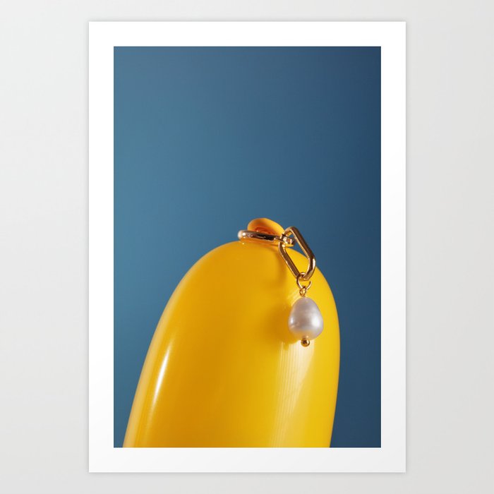 Pearl earring on yellow balloon Art Print