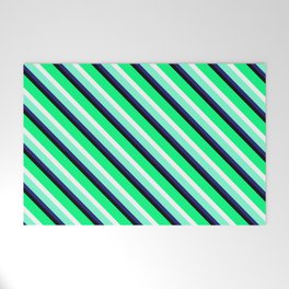 [ Thumbnail: Eyecatching Green, White, Aquamarine, Midnight Blue & Black Colored Stripes Pattern Welcome Mat ]
