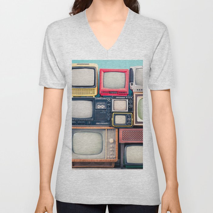 Retro TV receivers set from circa 60s, 70s and 80s of XX century, old wooden television stand with amplifier front mint blue wall background. Broadcasting, news concept. Vintage style filtered photo V Neck T Shirt