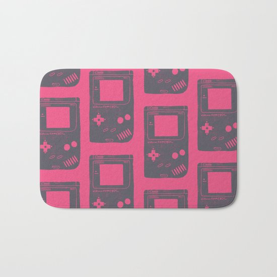 Game Boy on pink Bath Mat
