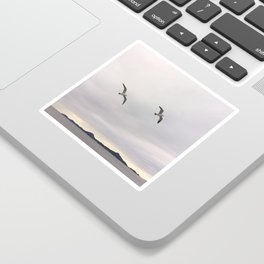 Two Soaring Seagulls | Two Birds Flying Over the Ocean With Cloudy Sky And Island In the Background Sticker