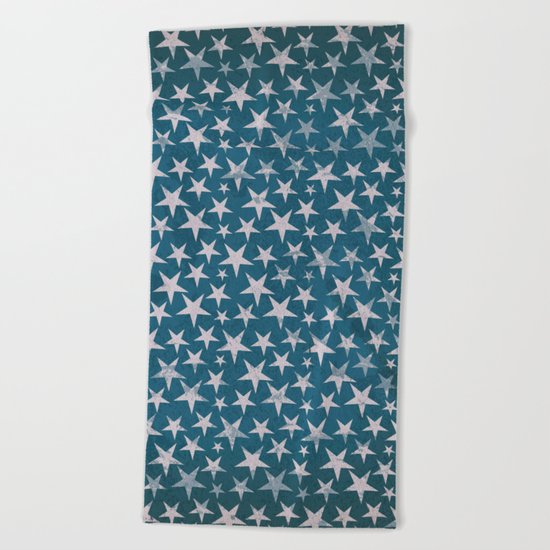 White stars on grunge textured blue background Beach Towel