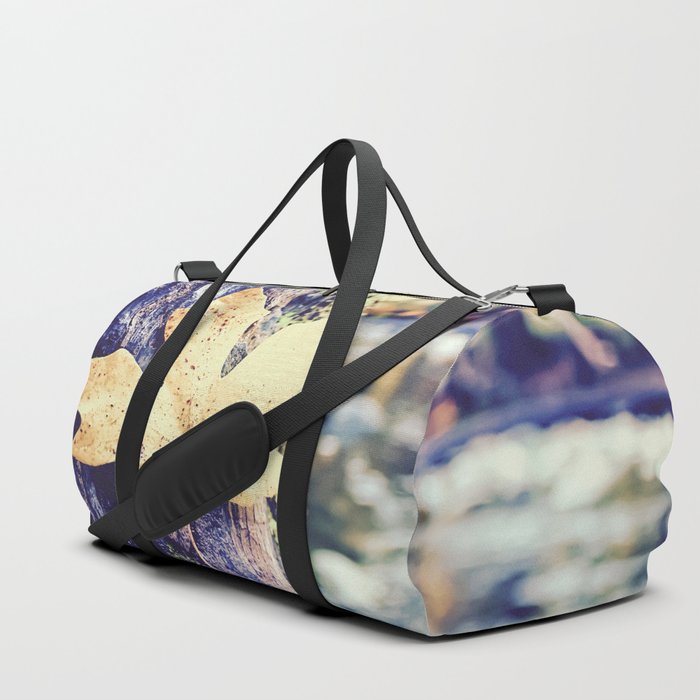 maple leaf on the tree with river and forest background Duffle Bag