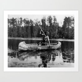 1908 Chippewa native American of the Ojibwe tribe spearing fishing in canoe vintage historical black and white photographic art print Art Print
