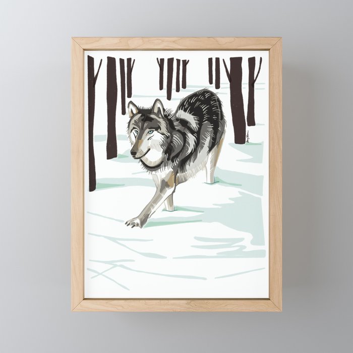 Wolf in the snow Framed Mini Art Print