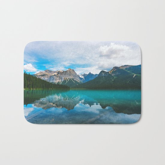 The Mountains and Blue Water Bath Mat