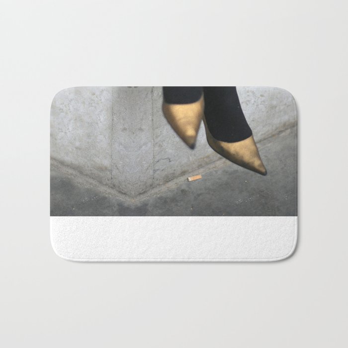 the girl in the gold shoes Bath Mat