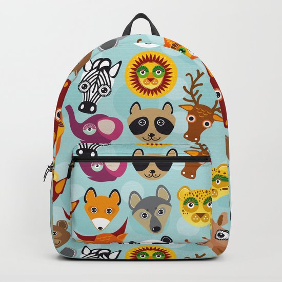 pattern with funny cute animal face on a blue background Backpack