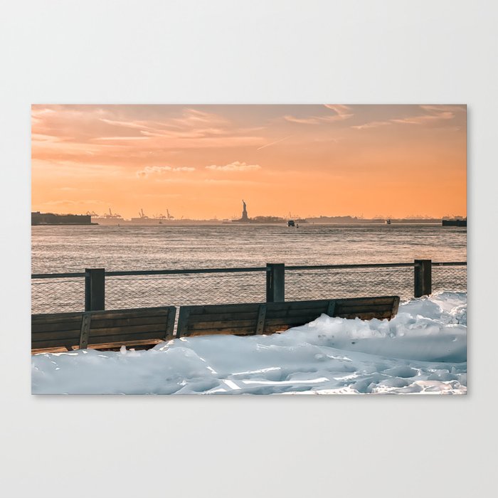 New York City Statue of Liberty at sunset after winter snowstorm Canvas Print