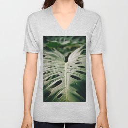 Photo of a green magical monstera leaf at a botanical garden on the Dutch canals in Leiden, The Netherlands | Fine Art Colorful Travel Photography | Unisex V-Neck