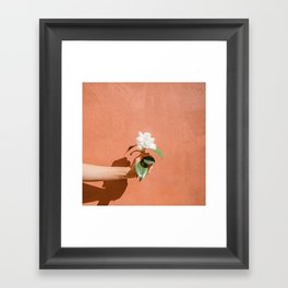 Hand Holding Flower Framed Art Print