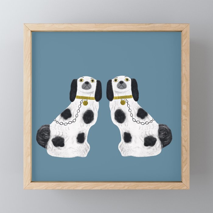 Pair of Staffordshire dogs on light blue Framed Mini Art Print