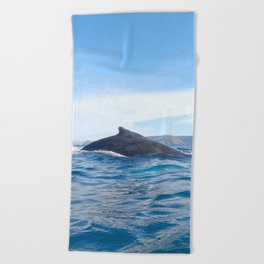 Whale fin of a humpback whale on the surface Beach Towel