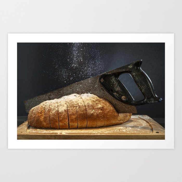 Rusty saw in fresh baked bread  Food photography with a twist