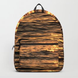 Beautiful Reflection of Sunlight in Sea at Sunset in Golden Color Backpack