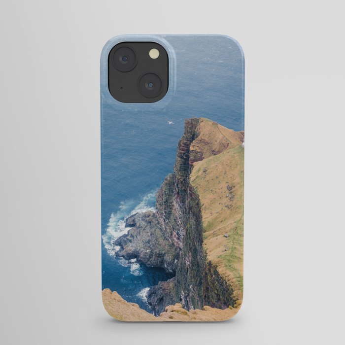 Bird-eye View Blue Atlantic Ocean Meets Cliffs with Lighthouse Faroe Island  iPhone Case