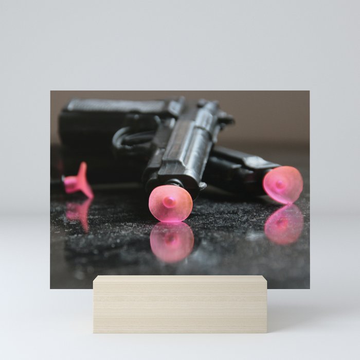 toy plastic guns Mini Art Print