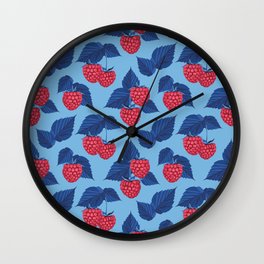Raspberry on blue background Wall Clock