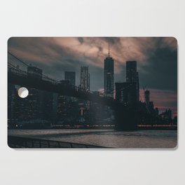 Brooklyn Bridge and Manhattan skyline at night in New York City Cutting Board