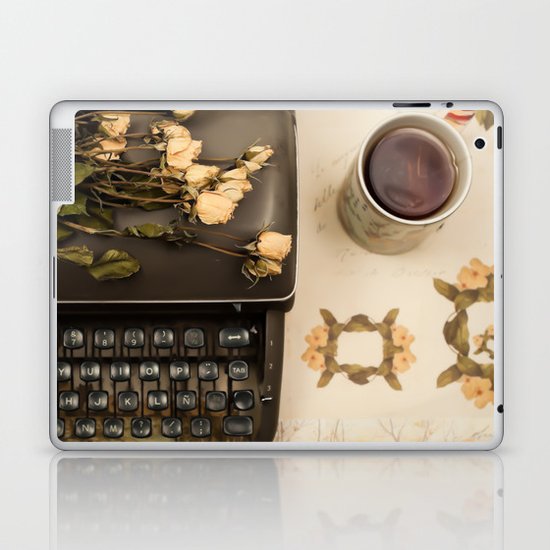 Little roses over an old typewriter and tea (Retro and Vintage Still Life Photography) Laptop & iPad Skin