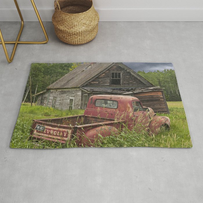 Old Chevy Pickup and Abandoned Farm House Rug