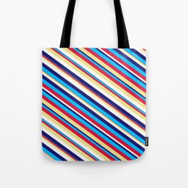 [ Thumbnail: Eyecatching Midnight Blue, Deep Sky Blue, Crimson, Tan, and White Colored Lined Pattern Tote Bag ]