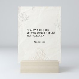 Study the past if you would define the future. Mini Art Print