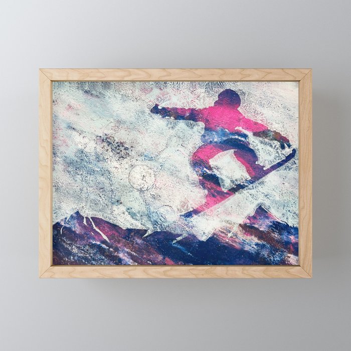Snowboarder flying over the mountains Framed Mini Art Print