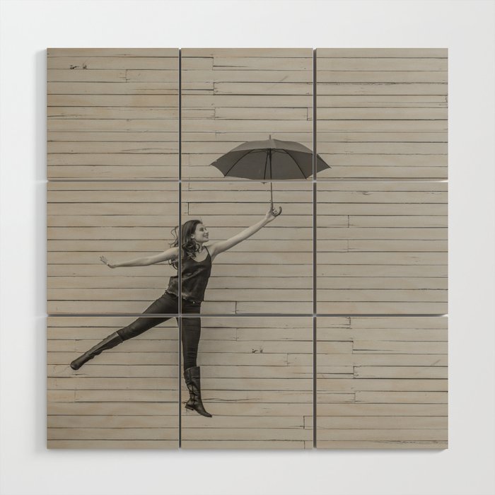 On the way to the break of day; woman flying with umbrella confidence inspirational female black and white photograph - photography - photographs Wood Wall Art