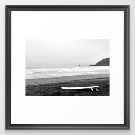 Lonely Surfboard Framed Art Print
