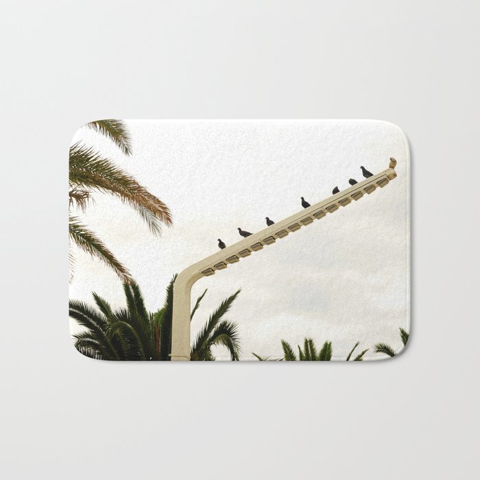 Birds perched on street lamp by the beach | Simple Travel Photography Bath Mat