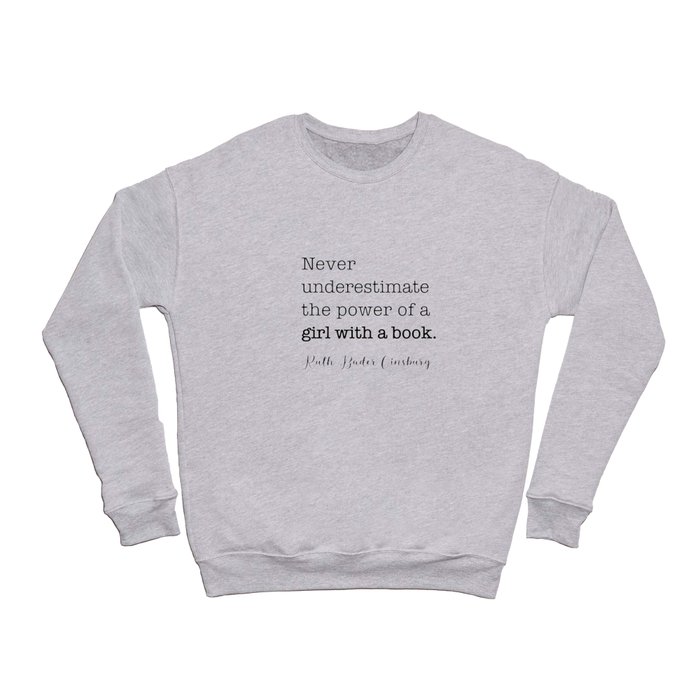 Never underestimate the power of a girl with a book. Crewneck Sweatshirt