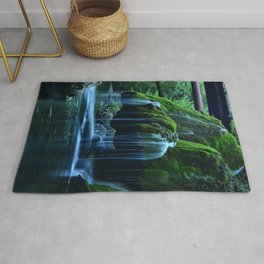 Color time-lapse photograph of waterfalls in mossy rock formation below trestle railroad bridge river nature photography - photographs Rug