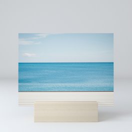 Above the sea Mini Art Print