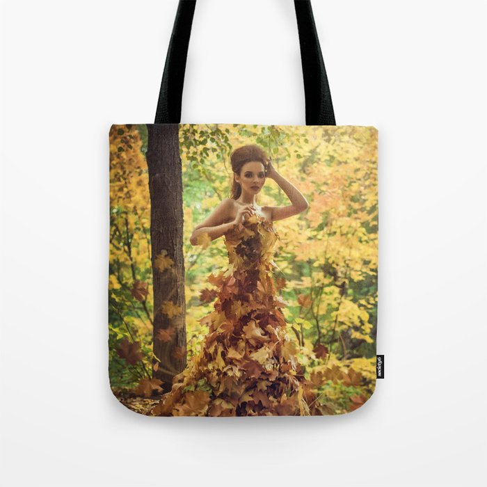Autumn leaves; female wearing gown dress of leaves magical realism fantasy color portrait photograph / photograph  Tote Bag