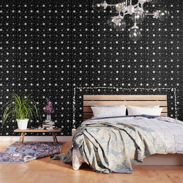 Cute white stars minimal seamless pattern on black Wallpaper by ARTbyJWP via society6.com - 21 Winter-inspired wallpaper murals