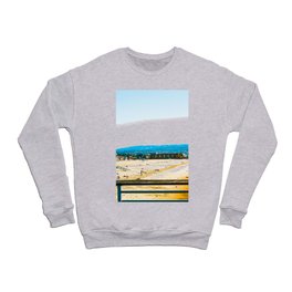 sandy beach with blue ocean wave at Manhattan Beach, California, USA Crewneck Sweatshirt