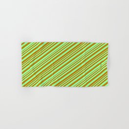 [ Thumbnail: Green & Dark Goldenrod Colored Stripes/Lines Pattern Hand & Bath Towel ]