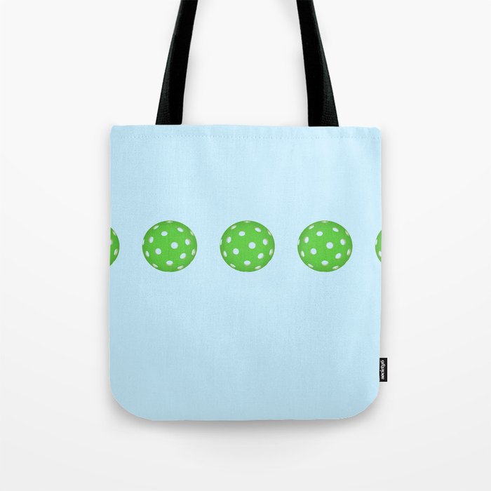 Pickleballs in a row. Green and Blue Tote Bag