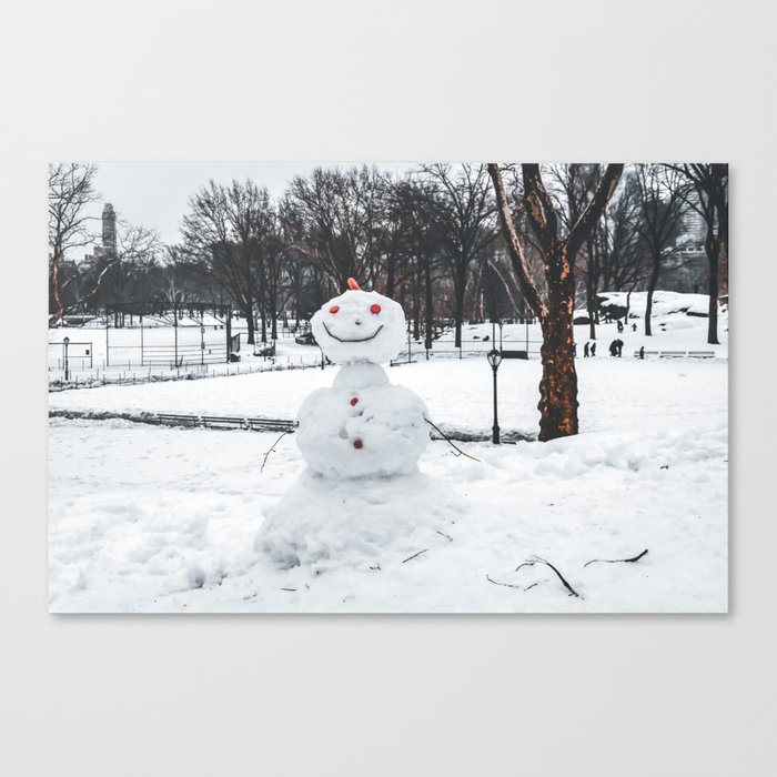 Snowman in New York City Central Park during the winter snowstorm blizzard Canvas Print