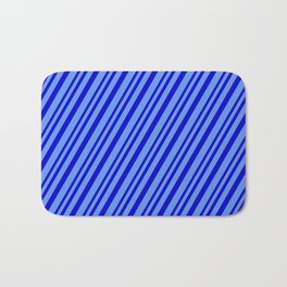 [ Thumbnail: Blue & Cornflower Blue Colored Lined Pattern Bath Mat ]