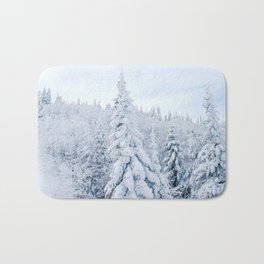 Snow covered forest Bath Mat