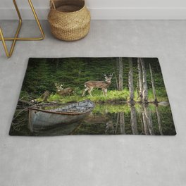 Whitetail Deer at the Edge of a Forest Pond by a Hunting Camp with Canoe Rug