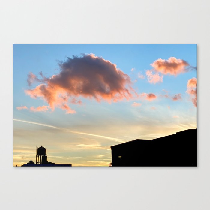 Pink clouds sunset over water tower in NY Canvas Print