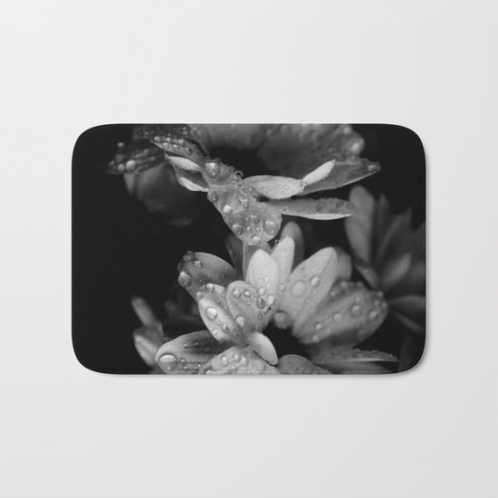 Flower and drops. Black and white. Bath Mat