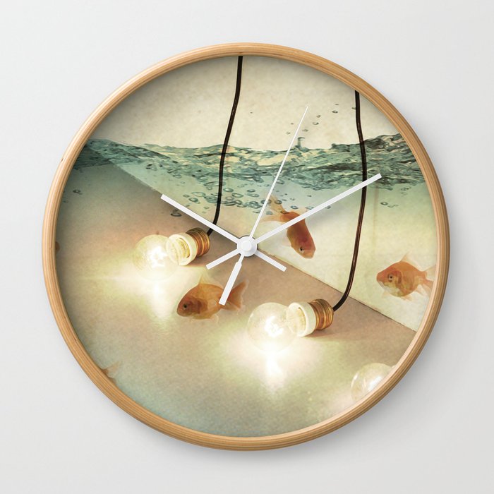 ideas and goldfish Wall Clock