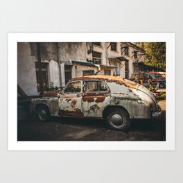 Brown Rusty old car in an industrial area in Europe, Vintage vehicle  Art Print