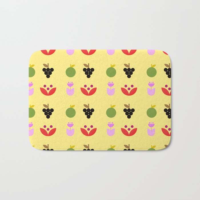 Simple modern flower and fruit pattern on yellow background Bath Mat