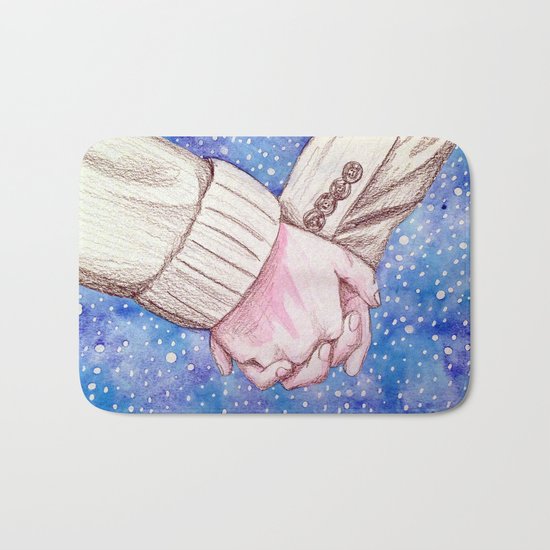 holding hands in the snow Bath Mat
