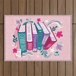 In life as in books dance with fairies, ride a unicorn, swim with mermaids, chase rainbows motivational quote // pastel pink background fuchsia pink violet and teal books Outdoor Rug